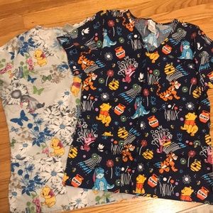 Two Pooh scrub tops